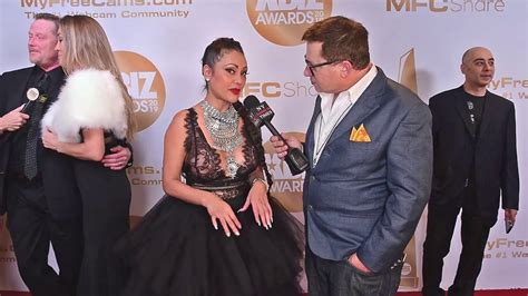 priya ray|Priya Rai is interviewed on the red carpet at the 2019 Xbiz .